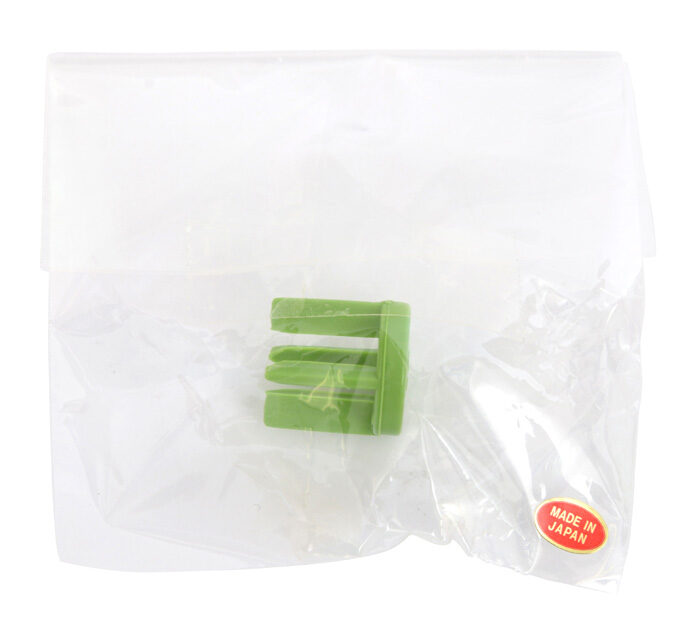 Éplucheur de légumes vert